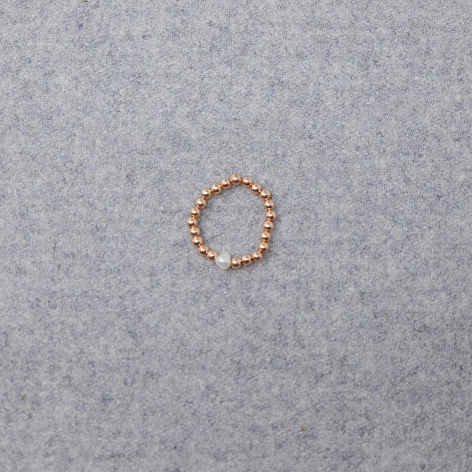 Ring elastisch rosévergoldete Perlen mit einer Perle